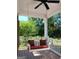 Inviting porch featuring a comfortable swing, offering a relaxing outdoor space at 531 Grant Rd, Brooks, GA 30205