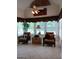Sunroom with comfortable seating and lots of natural light at 531 Grant Rd, Brooks, GA 30205