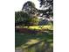 Lush yard with mature trees, creating a peaceful and shaded outdoor setting at 531 Grant Rd, Brooks, GA 30205