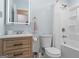 Bathroom featuring a vanity, toilet, and a shower/tub combo with a shower curtain at 2545 Rockbridge Nw Rd, Conyers, GA 30012