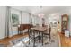 Cozy dining room with hardwood floors, elegant furnishing and decor at 2545 Rockbridge Nw Rd, Conyers, GA 30012
