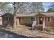 A closer view of the inviting front porch and well maintained walkway leading up to the front door at 2545 Rockbridge Nw Rd, Conyers, GA 30012