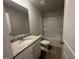 Bathroom featuring a granite vanity and tiled shower/tub combination at 20 Emerald Ln # 1, Covington, GA 30014
