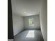 This bedroom features neutral walls and plush carpeting for a cozy, inviting space at 20 Emerald Ln # 1, Covington, GA 30014