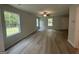 Bright living room featuring lovely wood-look floors and plentiful natural light at 20 Emerald Ln # 1, Covington, GA 30014