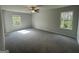 Spacious main bedroom with plush carpeting and generous natural light at 20 Emerald Ln # 1, Covington, GA 30014