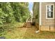 Home's backyard features steps, wooden deck and privacy at 1960 Morning Nw Walk, Acworth, GA 30102