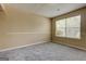 Neutral bedroom with gray carpeting and large windows for ample natural light at 1960 Morning Nw Walk, Acworth, GA 30102