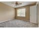 Neutral bedroom with window, ceiling fan, and carpet at 1960 Morning Nw Walk, Acworth, GA 30102