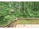 Wooden deck overlooking a lush, green landscape at 1960 Morning Nw Walk, Acworth, GA 30102