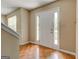 Welcoming foyer featuring gleaming hardwood floors, sidelight windows, and a bright entrance at 1960 Morning Nw Walk, Acworth, GA 30102