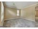 Neutral living room features soft carpeting, bright windows, and easy access to other rooms at 1960 Morning Nw Walk, Acworth, GA 30102