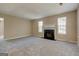 Living room area featuring a fireplace and bright windows at 1960 Morning Nw Walk, Acworth, GA 30102