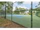 Community tennis court with fencing and green landscape at 1960 Morning Nw Walk, Acworth, GA 30102