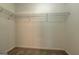 A walk-in closet with wire shelving and carpet flooring is ready for organization at 1960 Morning Nw Walk, Acworth, GA 30102