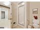 Bright bathroom with a standing shower and a view to another room at 9255 Betony Wood Trl, Jonesboro, GA 30236