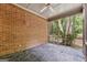 Relaxing sunroom with brick walls and outdoor views at 9255 Betony Wood Trl, Jonesboro, GA 30236
