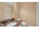 Bathroom with granite countertops, a mirror, and a toilet at 1029 Ector Nw Dr, Kennesaw, GA 30152