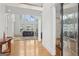 A bright living room with a large picture window and soaring ceilings viewed from the front entry at 1029 Ector Nw Dr, Kennesaw, GA 30152