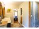 View of the bathroom with a double sink vanity leading to the Primary bedroom at 316 Gaithers Rd, Mansfield, GA 30055