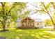 Charming home with a metal roof, inviting front porch, and a lush green lawn at 316 Gaithers Rd, Mansfield, GA 30055