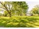 Charming country home surrounded by lush greenery and mature trees, creating a tranquil and private setting at 316 Gaithers Rd, Mansfield, GA 30055