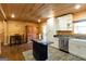 Efficient kitchen with stainless appliances, granite counters, and ample cabinet space at 316 Gaithers Rd, Mansfield, GA 30055