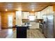 Bright kitchen with white cabinets, stainless appliances, and a farmhouse sink at 316 Gaithers Rd, Mansfield, GA 30055