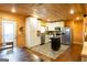 Charming kitchen with stainless appliances, white cabinets, and butcher block island at 316 Gaithers Rd, Mansfield, GA 30055