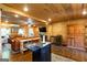 Cozy living room with warm wood accents and open access to kitchen and dining at 316 Gaithers Rd, Mansfield, GA 30055