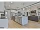 Contemporary kitchen featuring a large island with sink and pendant lighting at 415 Discovery Lake Dr, Fayetteville, GA 30215