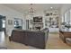 Open living room showcasing a fireplace, built-in shelving, and hardwood floors at 415 Discovery Lake Dr, Fayetteville, GA 30215