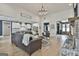 Spacious living room with a leather sofa, fireplace, and hardwood floors at 415 Discovery Lake Dr, Fayetteville, GA 30215