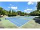 Multiple tennis courts offer ample recreational opportunities, set amidst lush green surroundings at 415 Discovery Lake Dr, Fayetteville, GA 30215