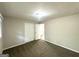 Comfortable bedroom with carpeted floors and ample closet space at 3375 Brenda Ln, Lithia Springs, GA 30122