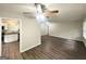 Spacious living room featuring hardwood floors, a ceiling fan, and neutral paint at 3375 Brenda Ln, Lithia Springs, GA 30122