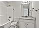 Well-lit bathroom featuring tub/shower combo and granite vanity at 101 Sumner Place Ct, Peachtree City, GA 30269