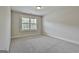 This bedroom features a large window with ample natural light at 101 Sumner Place Ct, Peachtree City, GA 30269