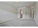 Spacious bedroom with ensuite bathroom and neutral tones at 101 Sumner Place Ct, Peachtree City, GA 30269