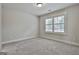 Bright bedroom with large window offering plentiful natural light at 101 Sumner Place Ct, Peachtree City, GA 30269