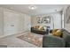 Comfortable living room features plush seating, bright rug, and modern decor at 101 Sumner Place Ct, Peachtree City, GA 30269