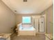 Bright bathroom features a soaking tub, glass-enclosed shower, and granite countertop vanity at 3814 Clear Lake Nw Way, Acworth, GA 30101