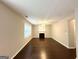 Large living room showcasing a fireplace and hardwood flooring, offering a comfortable ambiance at 3814 Clear Lake Nw Way, Acworth, GA 30101