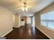 Open-concept living room showcasing hardwood flooring, natural light, and seamless flow to the kitchen at 3814 Clear Lake Nw Way, Acworth, GA 30101