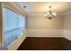 Spacious living room featuring large windows and beautiful hardwood flooring, perfect for entertaining at 3814 Clear Lake Nw Way, Acworth, GA 30101