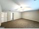 Large main bedroom featuring neutral carpet and an ensuite bathroom providing a private retreat at 3814 Clear Lake Nw Way, Acworth, GA 30101