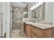 Beautiful bathroom showcasing a frameless shower and a marble top vanity at 209 Smokerise Trce, Peachtree City, GA 30269