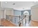 Elegant foyer with hardwood floors, a statement chandelier and beautiful staircase at 209 Smokerise Trce, Peachtree City, GA 30269