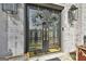 Close up of the beautiful front door with wreath decor, and glass detail at 209 Smokerise Trce, Peachtree City, GA 30269