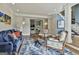 Cozy living room with hardwood floors and an opening into another living space at 209 Smokerise Trce, Peachtree City, GA 30269